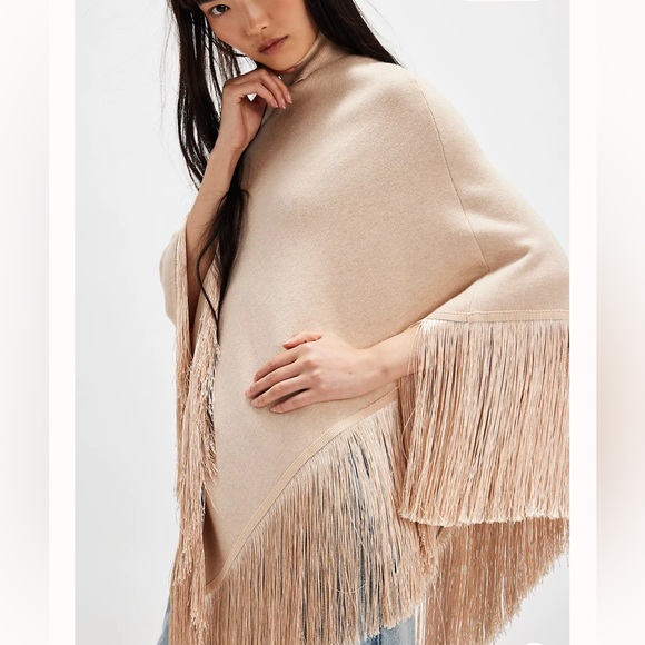 Free People “Understated Leather” Riverwalk Poncho